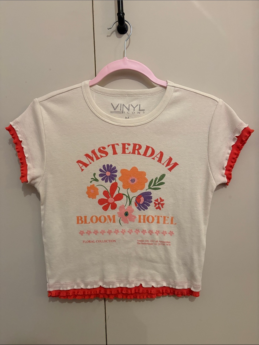'Amsterdam Bloom Hotel' Cream Tee with Red Trim